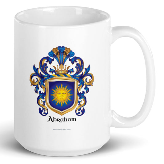 A white mug with the Abraham Family Crest featuring a blue shield with a sun facemotif known as the "sun in splendour" 