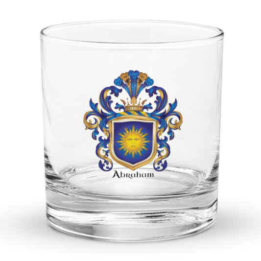 Abraham Family Crest Rocks Glass featuring a coat of arms with a blue shield with a sun face motif known as the "sun in splendour"  held up by a woman on a white background - Family Crests Store