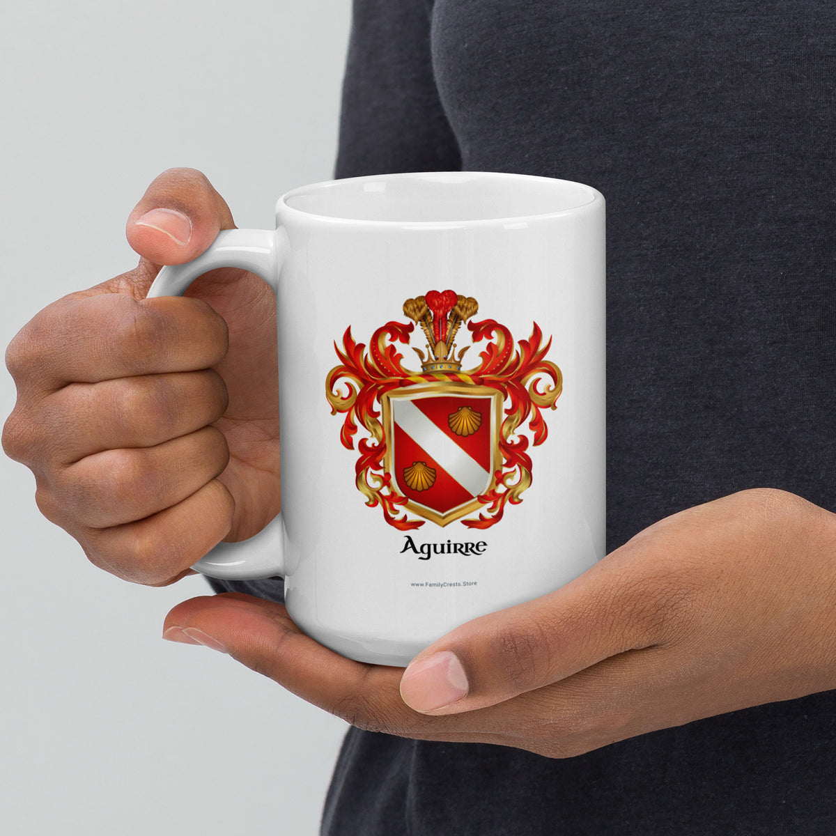 Aguirre-family-crest mug held in 2 hands