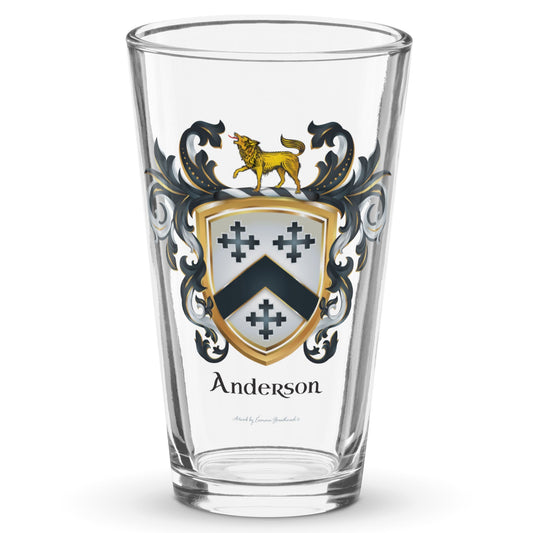 Clear pint glass with Anderson Family Crest featuring three black crosses and a black chevron on a white shield with a hound standing on thew crest of the shield