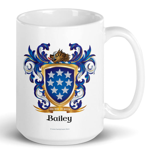 A white mug with handle to right, on a white background, printed with the Bailey Family Crest featuring a blue shield with 9 white stars and a boar's head on the crest of the shield.