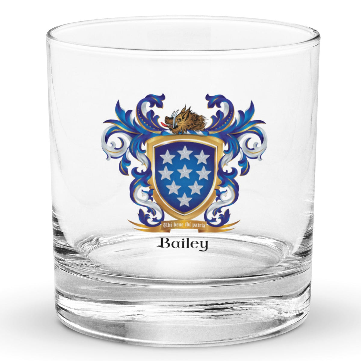 A clear classic rocks glass on a white background, printed with the Bailey Family Crest featuring a blue shield with 9 white stars and a boar’s head on the crest of the shield.