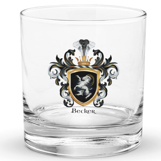 A classic clear heavy base rocks glass on a white background with the Becker Family Crest printed on it, featuring an ibex on a black shield.
