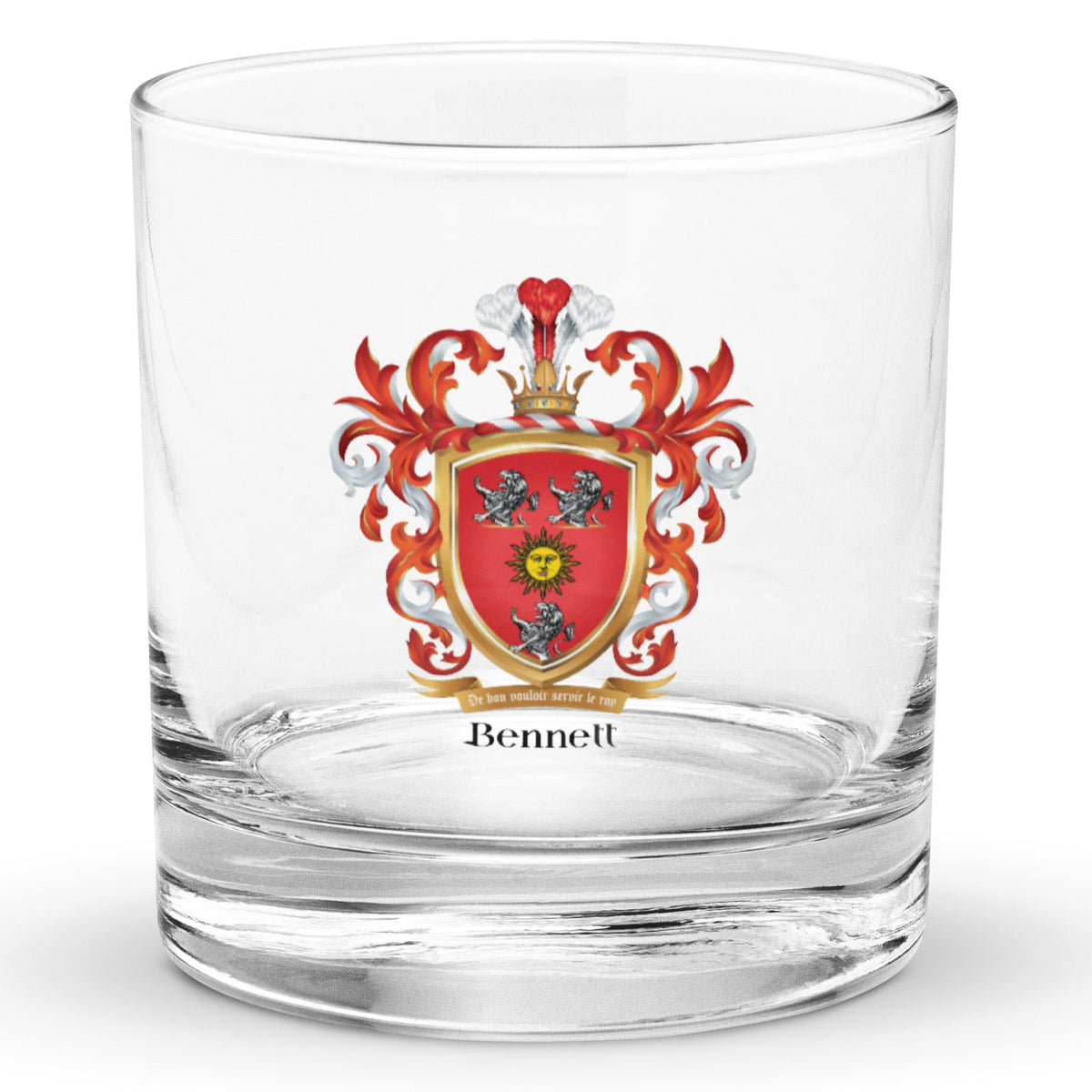 A clear classic heavy base rocks glass on a white background, printed with the Bennett Family Crest featuring 3 white lions and a golden sun.