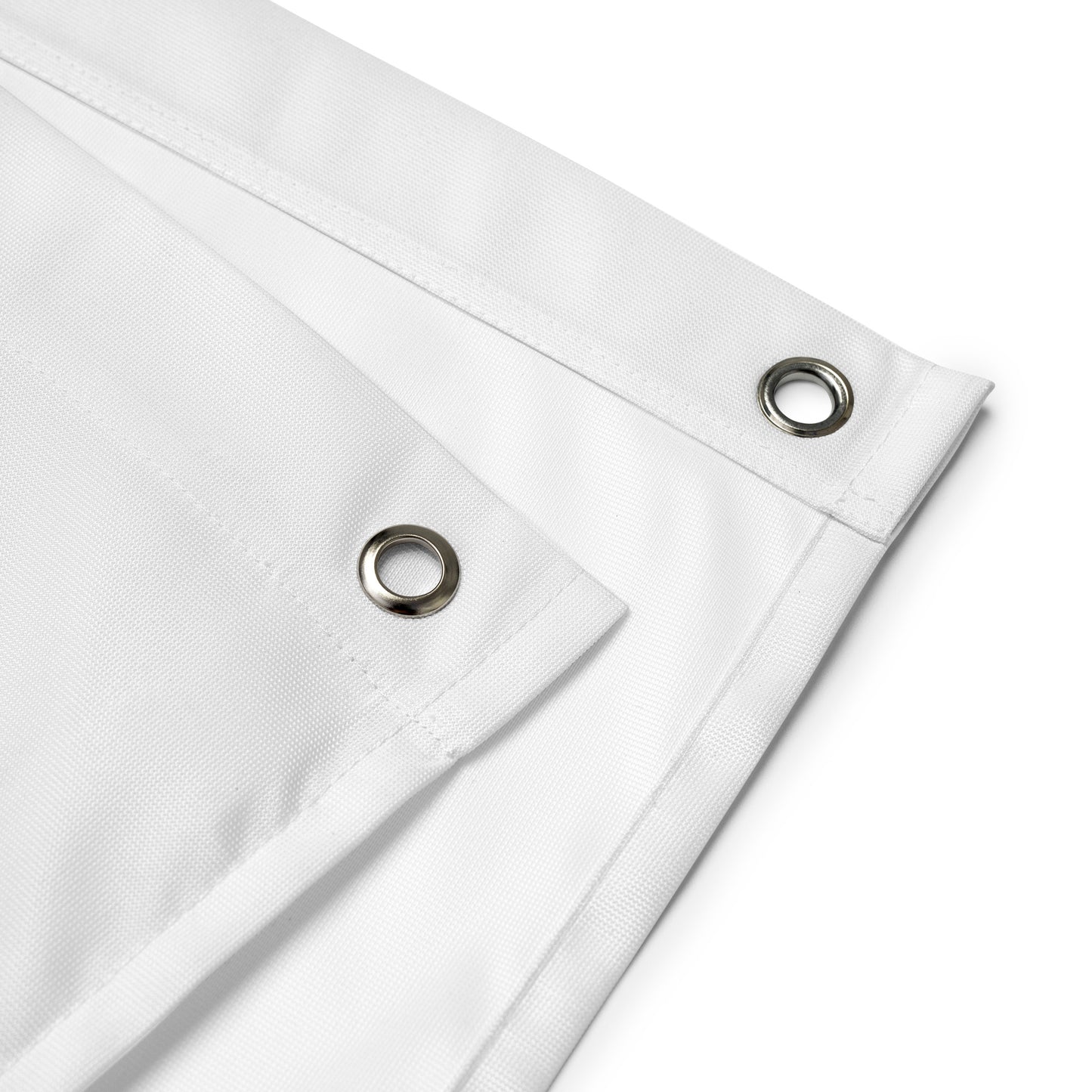 White fabric with metal eyelets on a white background