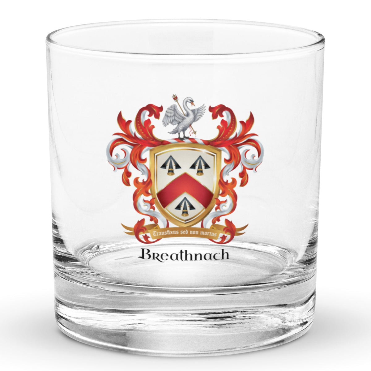 A clear glass rocks tumbler with a custom family crest printed on the front, featuring a red, white, and gold coat of arms above the name 'Breathnach' in black text, shown on a white background.