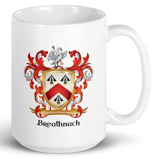 A white mug with the Breathnach family crest featuring 3 black arrowheads, a red chevron and a white swan above the shield