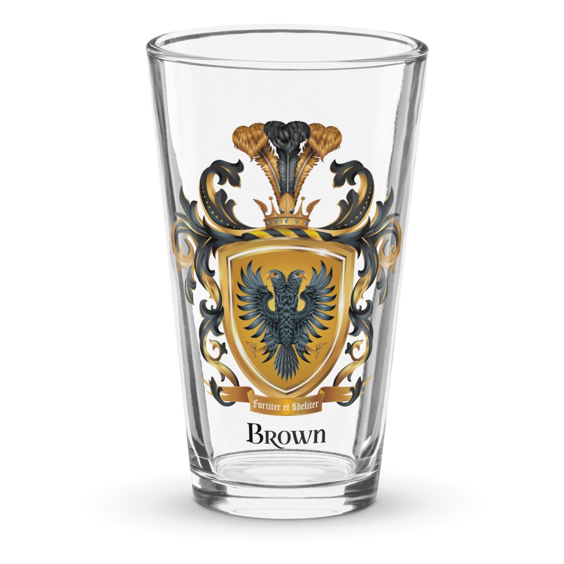 A pint sized beer clear glass with a detailed illustration of the Brown Family Crest featuring a black two-headed eagle pictured against a clear white background