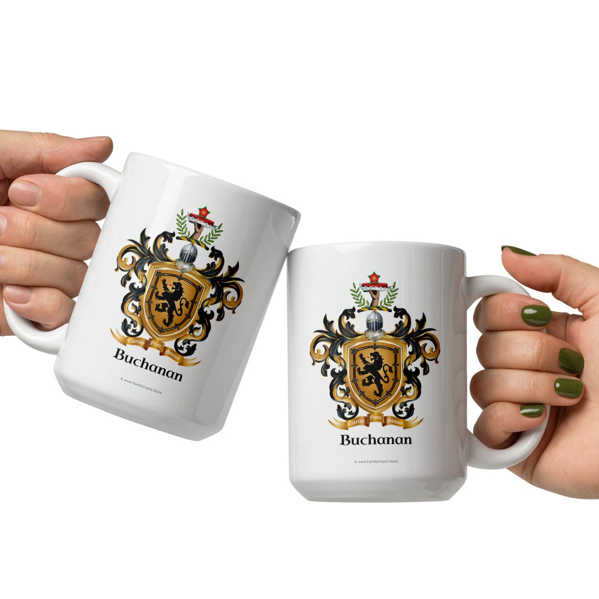 Two hands holding white mugs with a Buchanan Family Crest on a white background