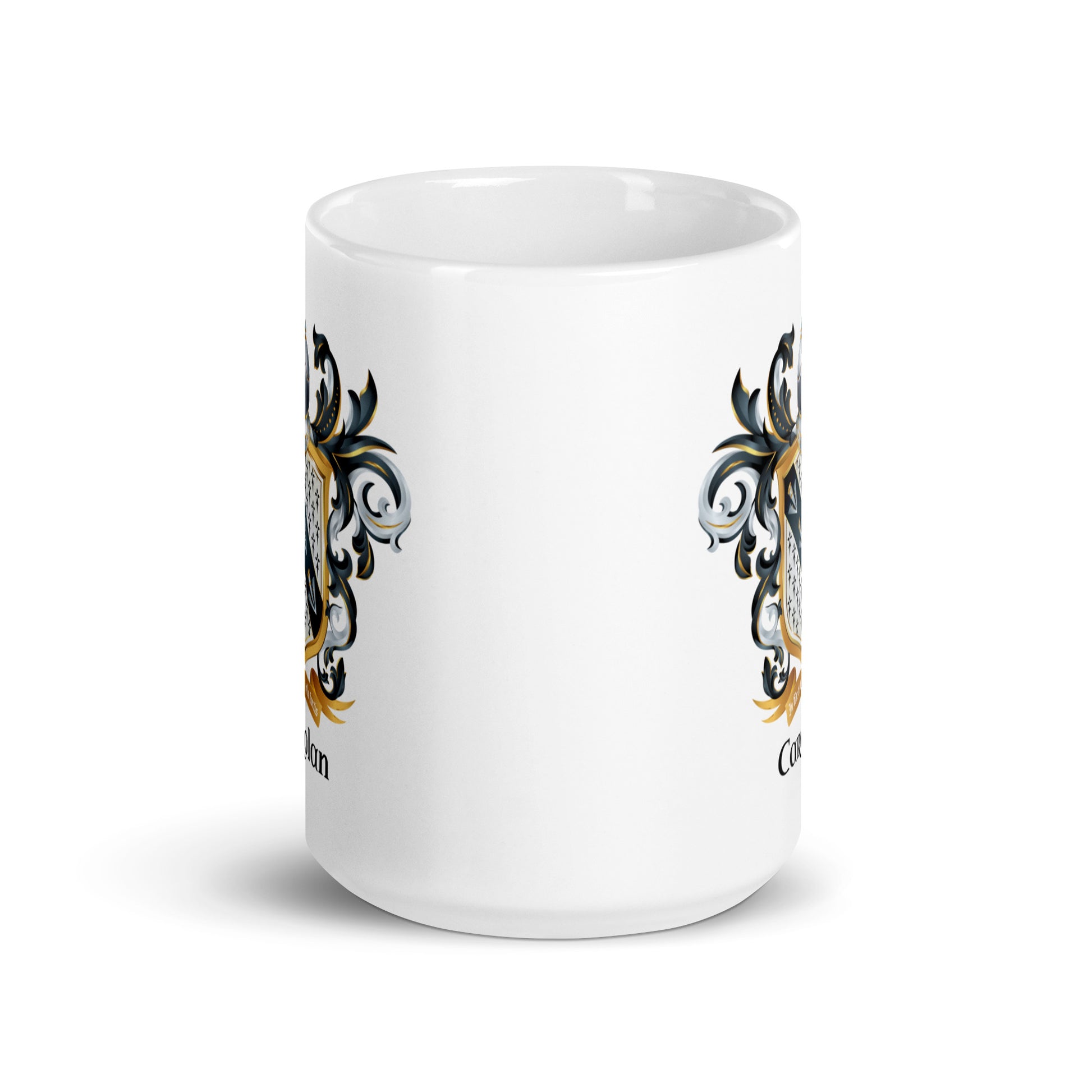 A white ceramic mug featuring a decorative crest design printed on the side, shown against a plain white background.