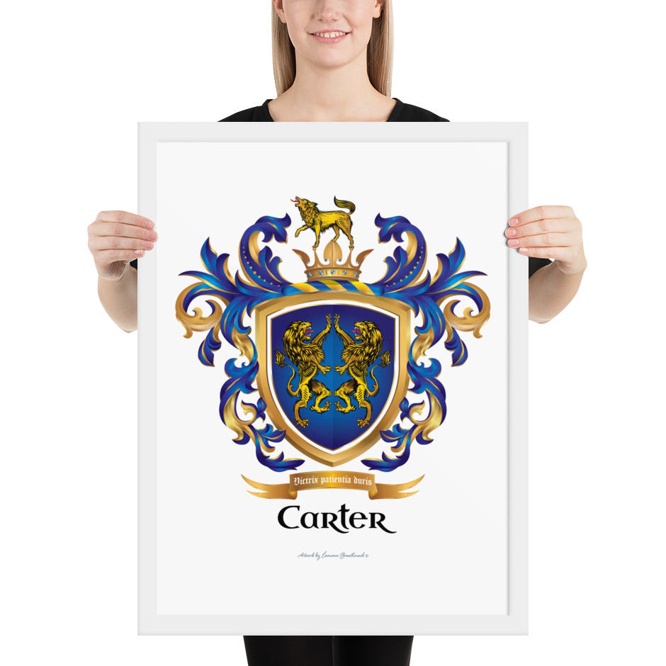 A woman standing in a white background, holding a white framed print of the Carter Family Crest featuring 2 lions on a blue shield and a wolf on a crown.