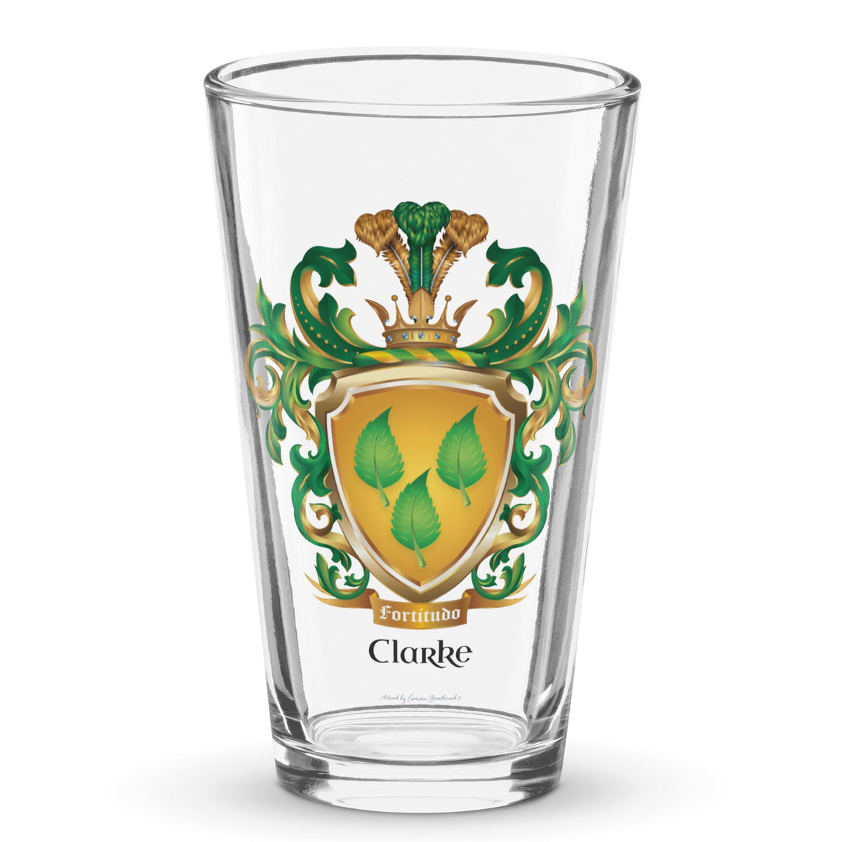 A pint beer glass on a white background with the Clarke Family Crest on the front showing a golden shield with 3 green leaves