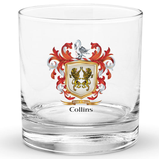 A clear classic heavy base rocks glass on a white background, printed with the Collins Family Crest featuring 2 lions on a white shield.