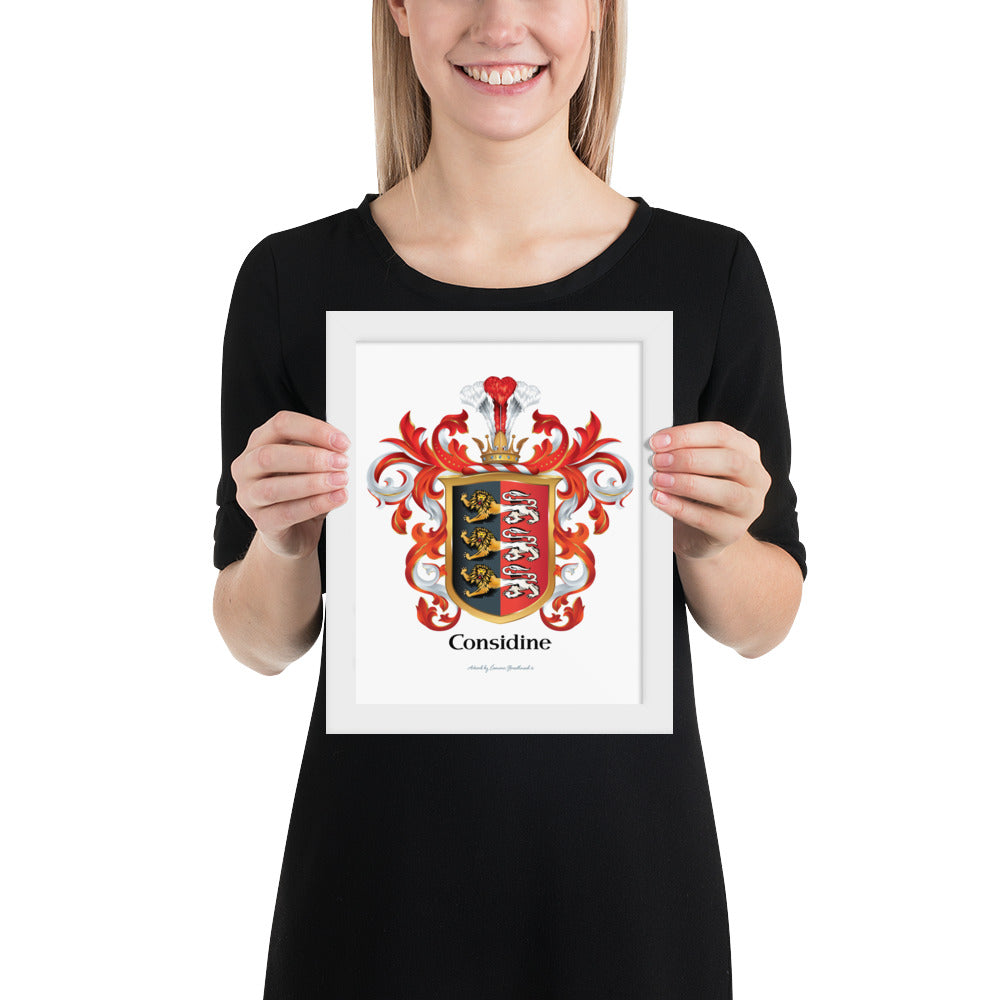 A woman holding an 8 x 10 inch framed Considine Family Crest art-print with 3 lions on a shield that has a vertical colour split with black on left and red on right printed on white paper
