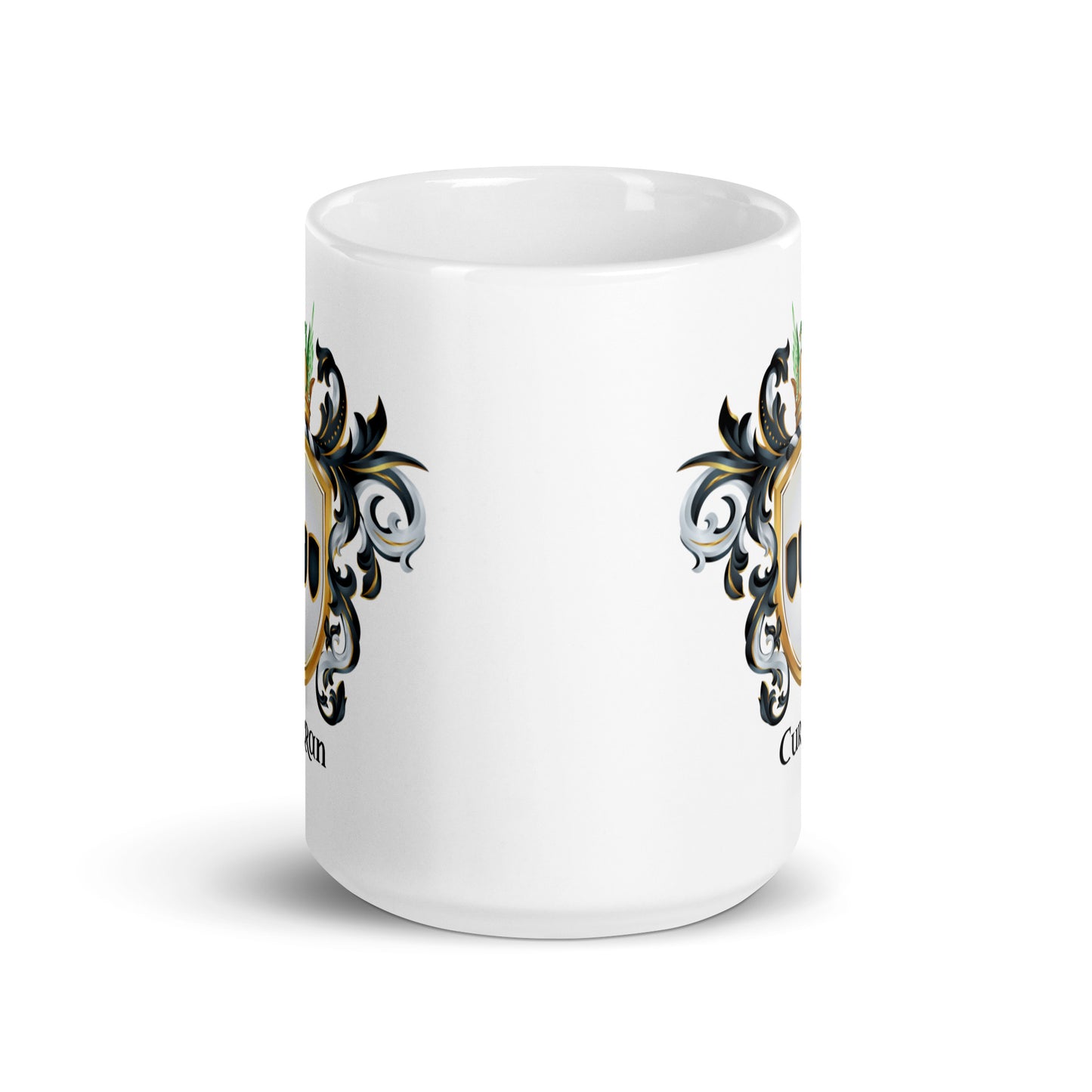 A white ceramic mug with a detailed graphic print featuring a black ornate flourishes, and gold accents of coat of arms on two sides shown on a clean white background.