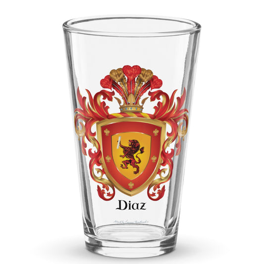 A clear classic pint beer glass on a white background, printed with the Diaz Family Crest featuring a red lion.