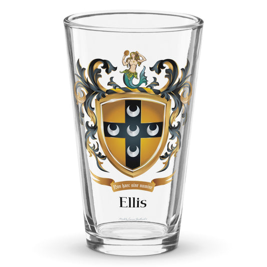 A clear classic pint beer glass on a white background, printed with the Ellis Family Crest featuring a gold shirld with a black cross and 5 crescents and a mermaid on the crest of the shield.