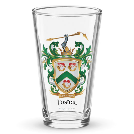 A clear classic pint beer glass on a white background, printed with the  Foster Family Coat of Arms featuring a white shield with a green chevron and 3 gold horns.