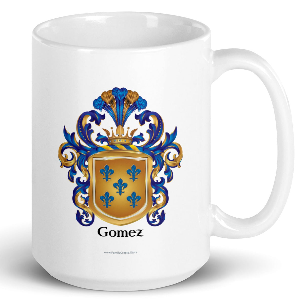 A white mug on a white background, printed with the Gomez Family Crest featuring 5 blue fleur-de-lis on a gold shield.