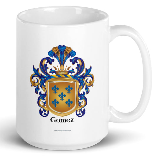 A white mug on a white background, printed with the Gomez Family Crest featuring 5 blue fleur-de-lis on a gold shield.