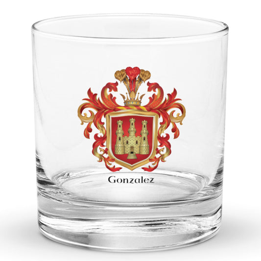 The Gonzalez Family Crest rocks glass with a coat of arms on the front featuring a red shield with a gold castle with 3 towers 