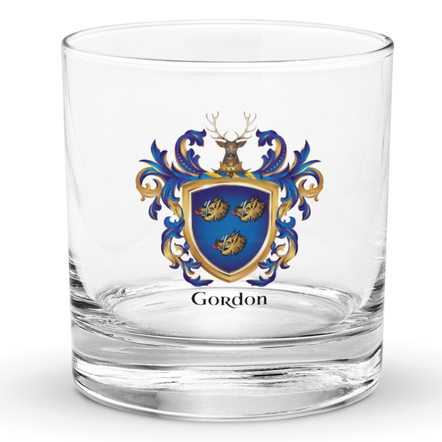 A clear glass rocks tumbler with a custom printed Gordon-Family-Crest coat of arms featuring a blue shield, gold boar heads, and a stags head on the crest above the shield with the name 'Gordon' printed below in black.