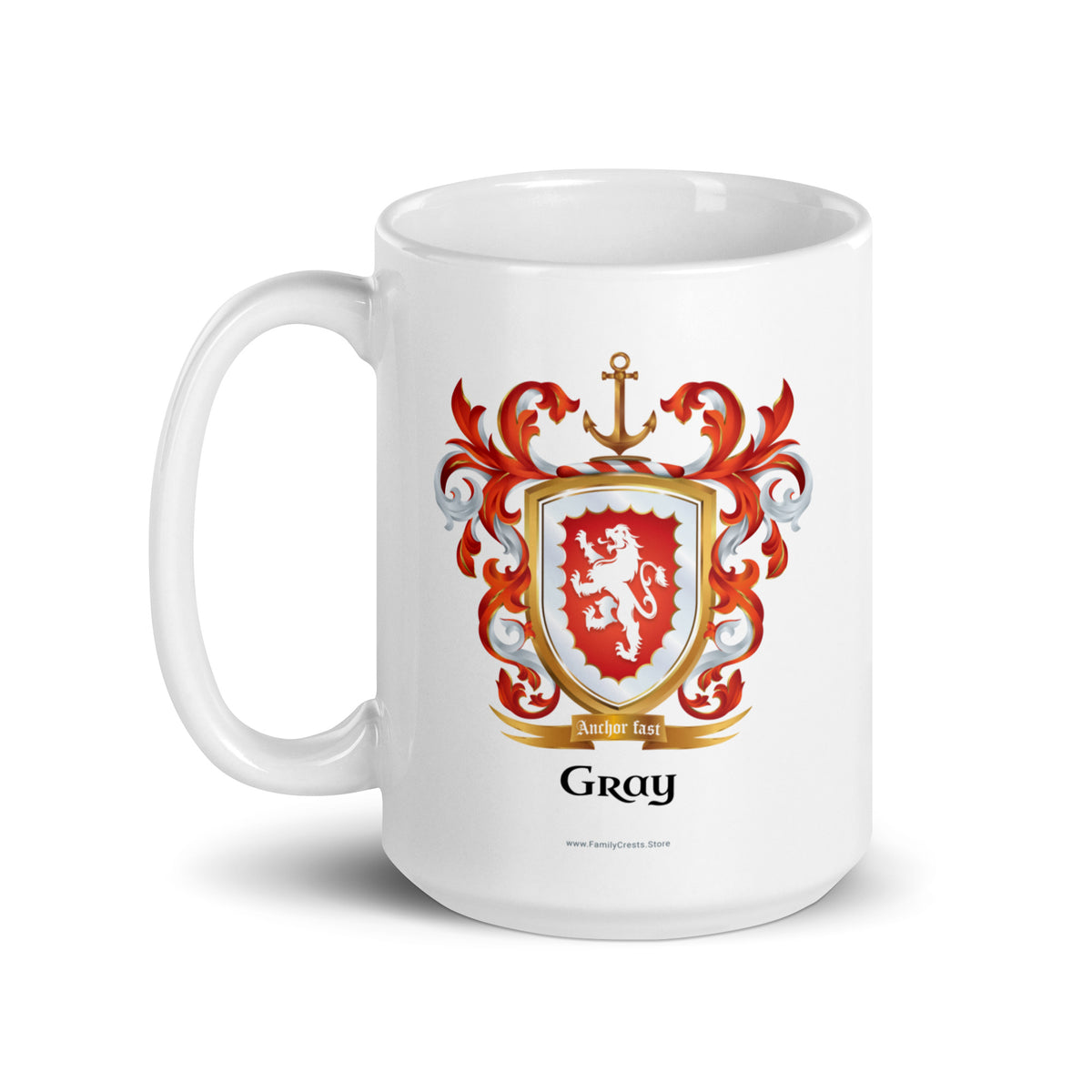 A white mug with handle to left, on a white background, printed with the Gray Family Crest featuring a red shield and white lion and a gold anchor on the crest.