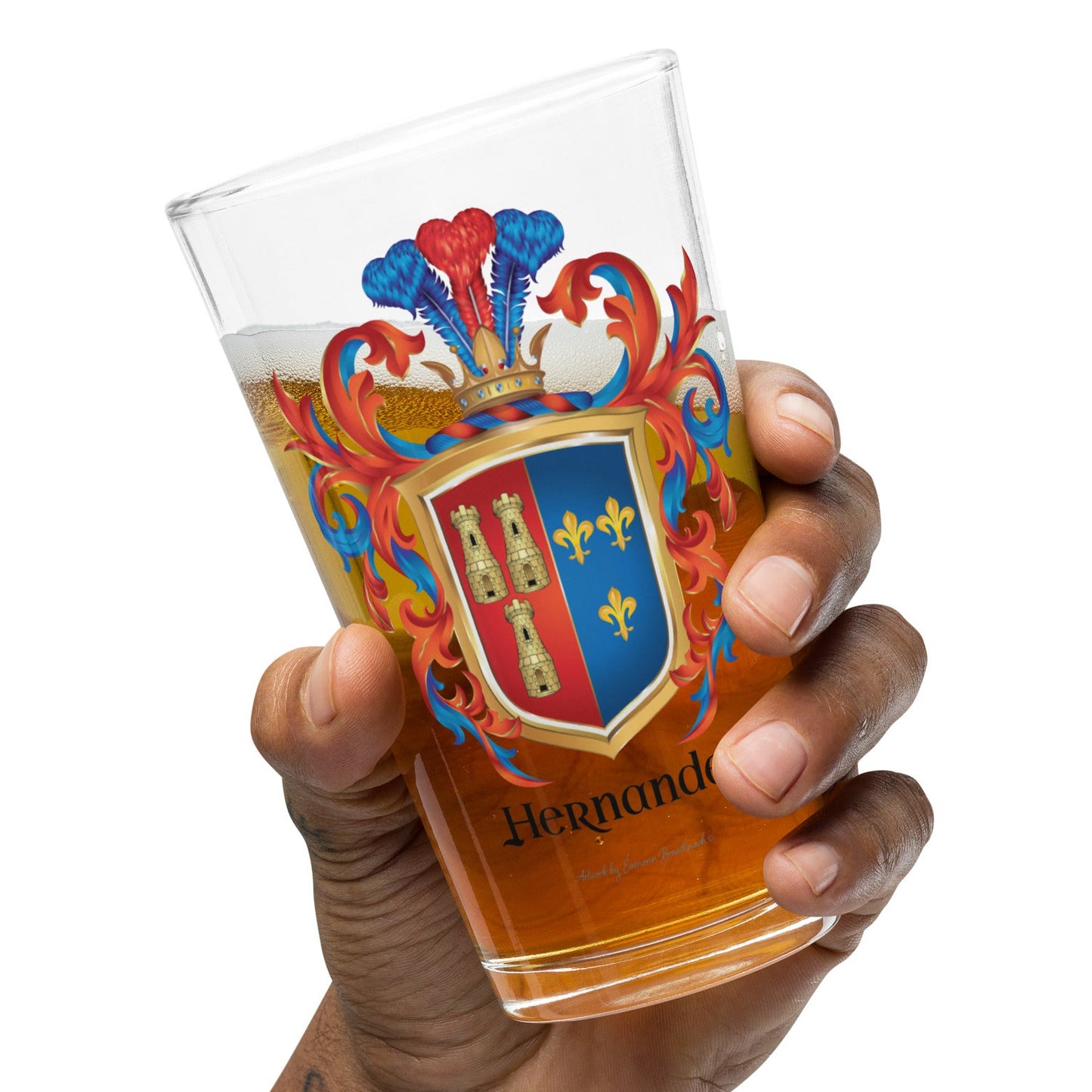 Hand holding a glass of beer with a Hernandez-Family-Crest