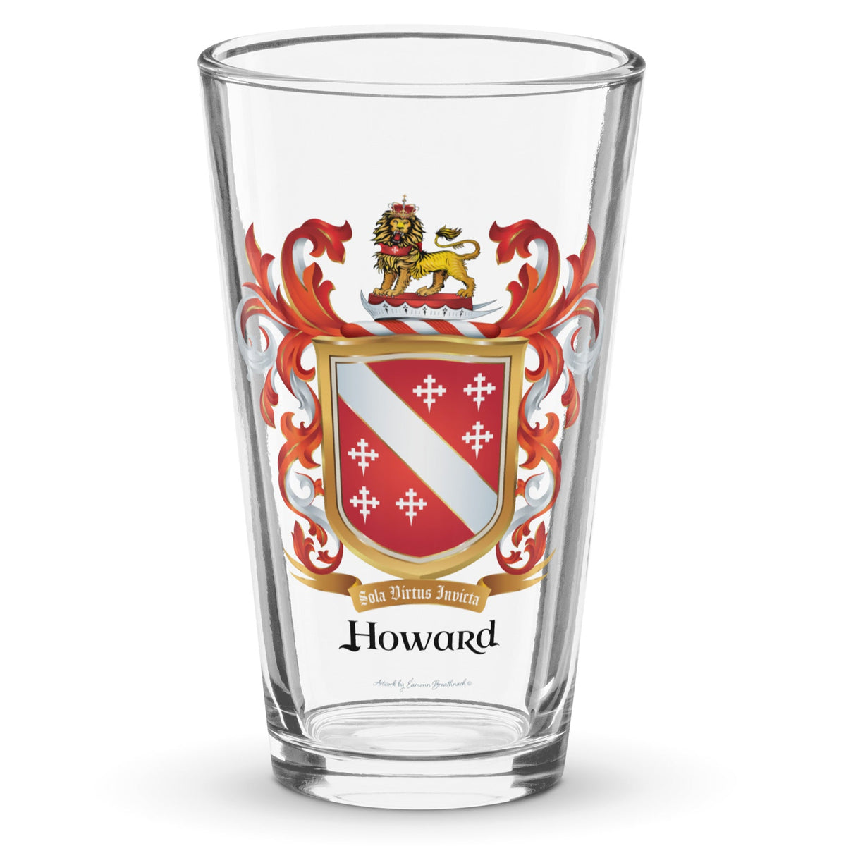 A clear classic pint beer glass on a white background, printed with the Howard Family Crest which has a red shield with a white diagonal band and 6 white crosses.