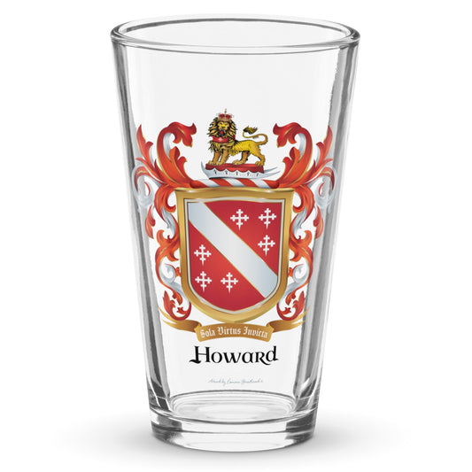 A clear classic pint beer glass on a white background, printed with the Howard Family Crest which has a red shield with a white diagonal band and 6 white crosses.