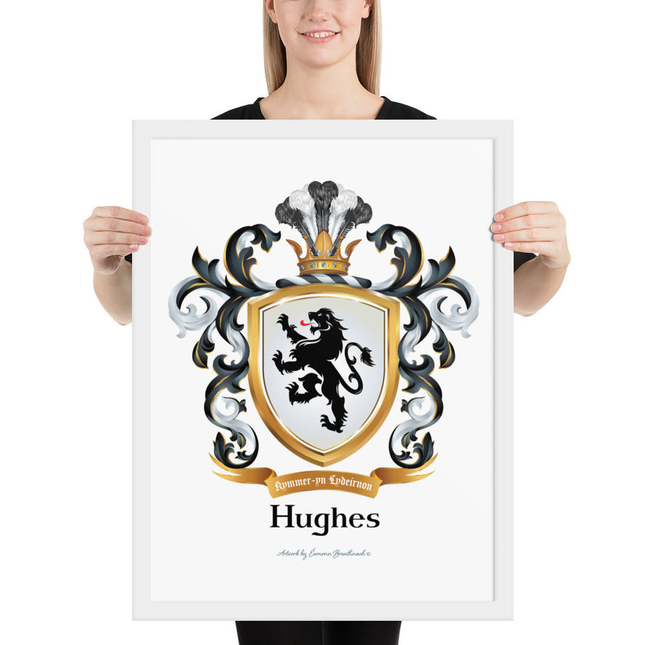 A woman standing in a white background, holding a white framed print of the Welch Hughes Family Crest featuring a featuring a black lion on a white shield.