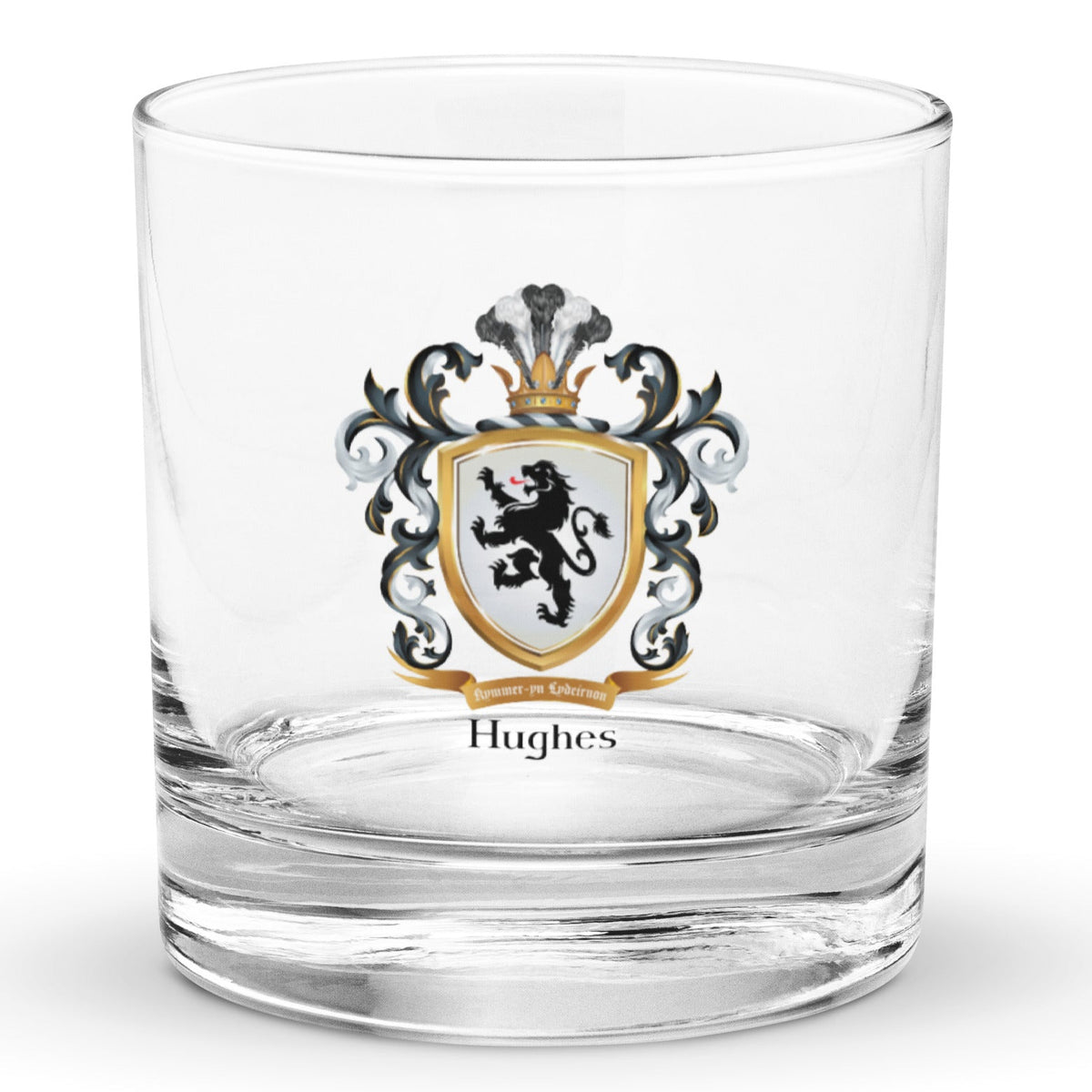 A clear classic heavy base rocks glass on a white background, printed with the Welch Hughes Family Crest featuring a featuring a black lion on a white shield.