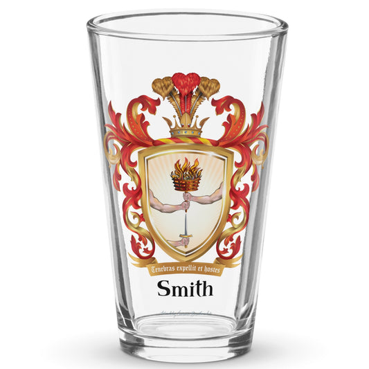 A classic pint beer glass with the Irish Smith Family Crest showing 3 arms, a sword and a brazier of fire