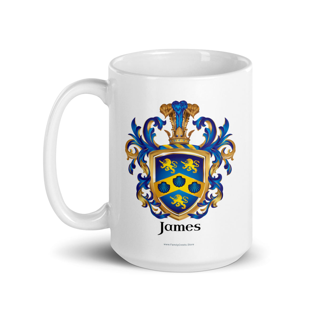 A white mug with handle to left, on a white background, printed with the James Family Crest which features a blue shield with a golden chevron containing 3 blue clam shells and two gold lions above the chevron and one beneath it.