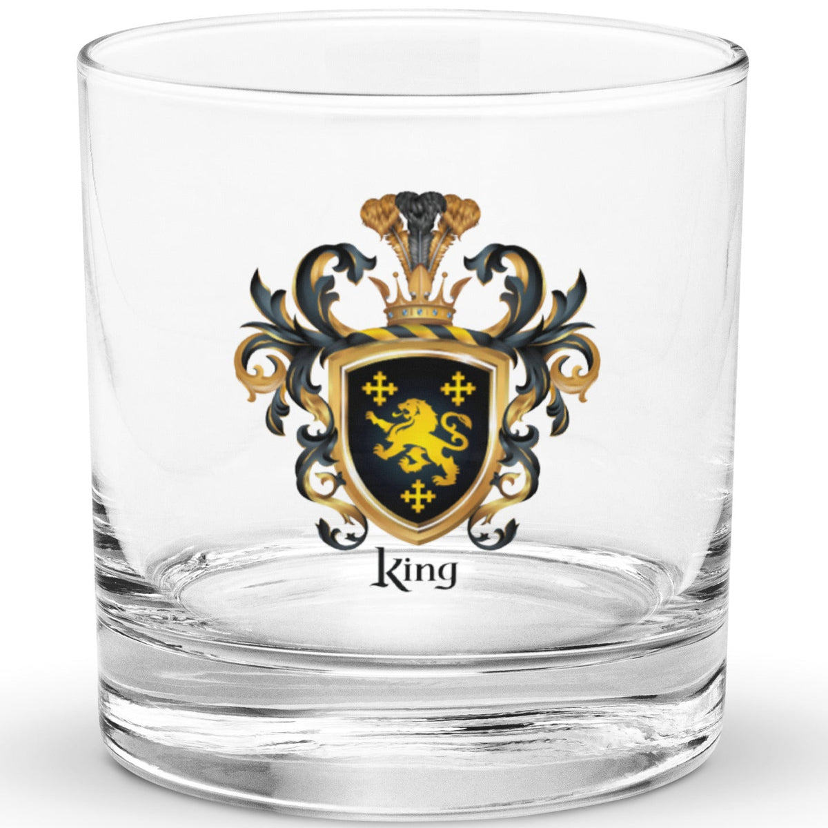 A classic clear rocks glass with a heavy base on a white background and the glass has a King Family Crest printed on it featuring 3 GOLD CROSSES AND A GOLD LION ON A BLACK SHIELD.