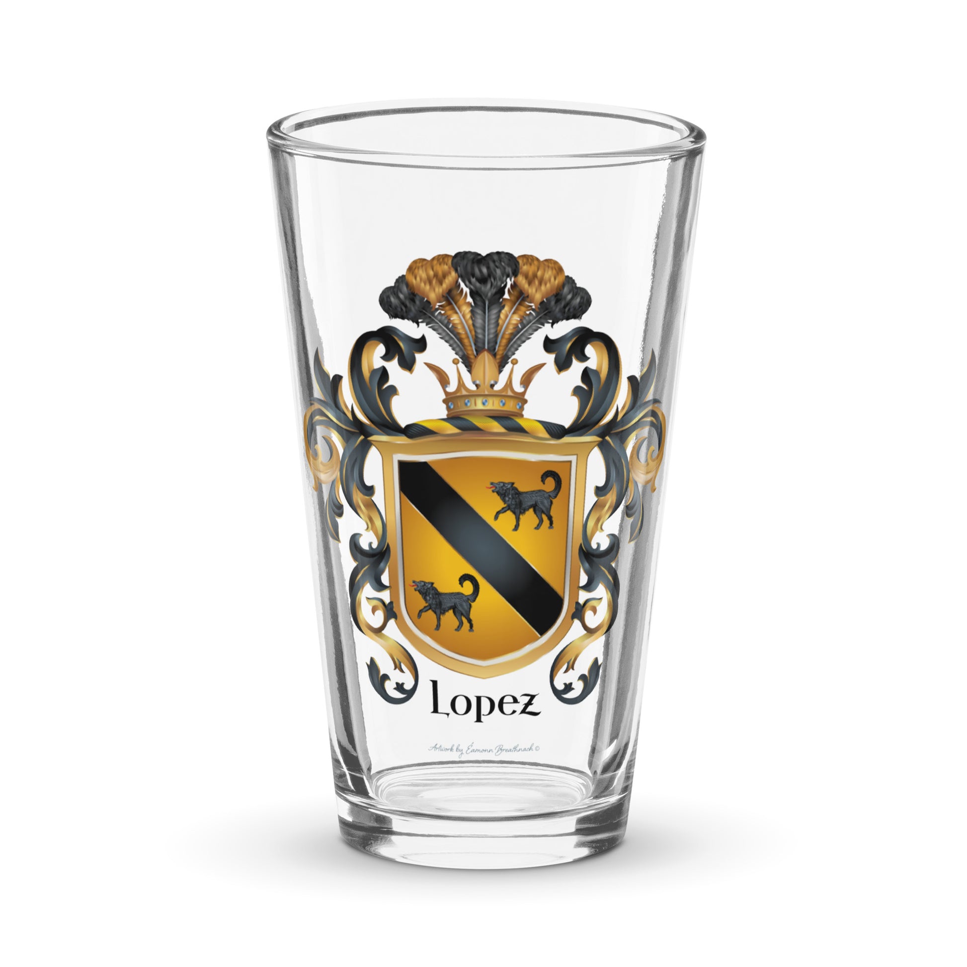 A pint beer glass with the Lopez Family Crest printed on the front featuring a gold shield with a black diagonal band and two black wolves.