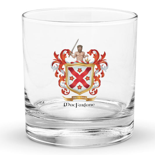 A rocks glass pictured against a white background with a MacFarlane Family Crest on the front of the glass