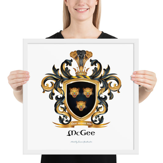 A woman holding a framed artptint of the McGee Family Crest