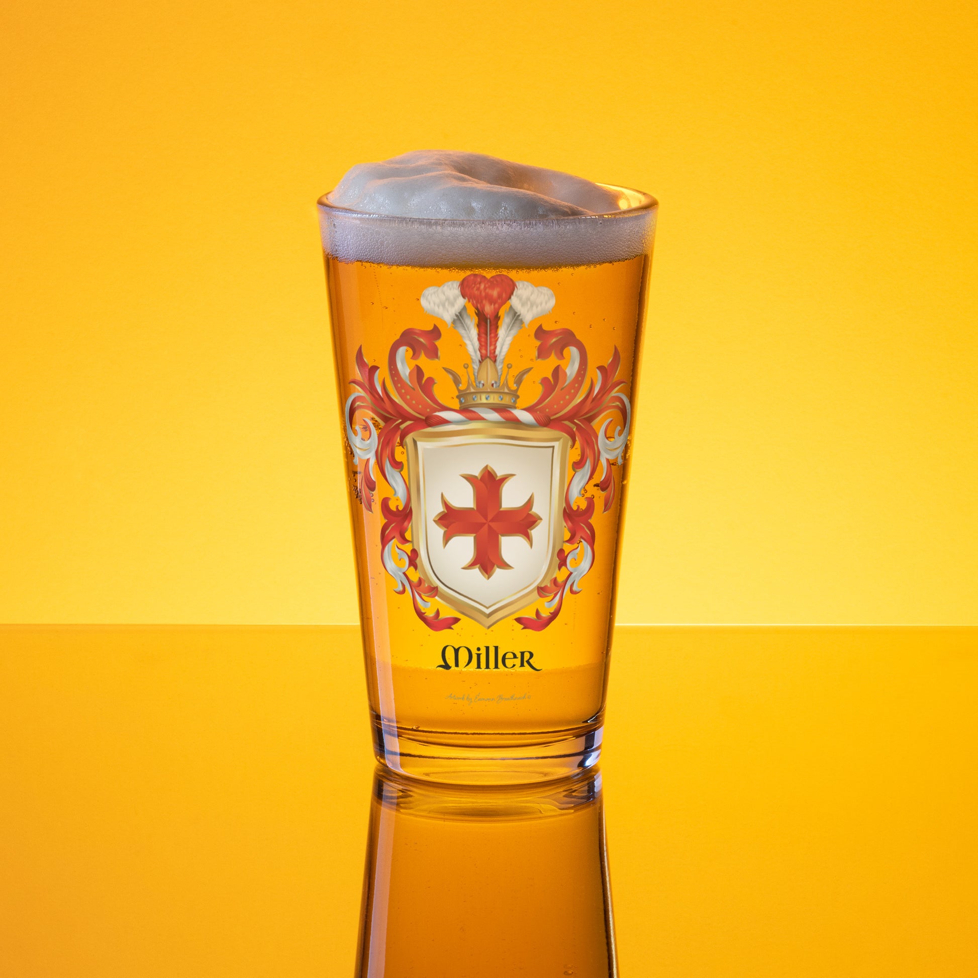 Glass of beer with a Miller Family Crest design on a yellow background
