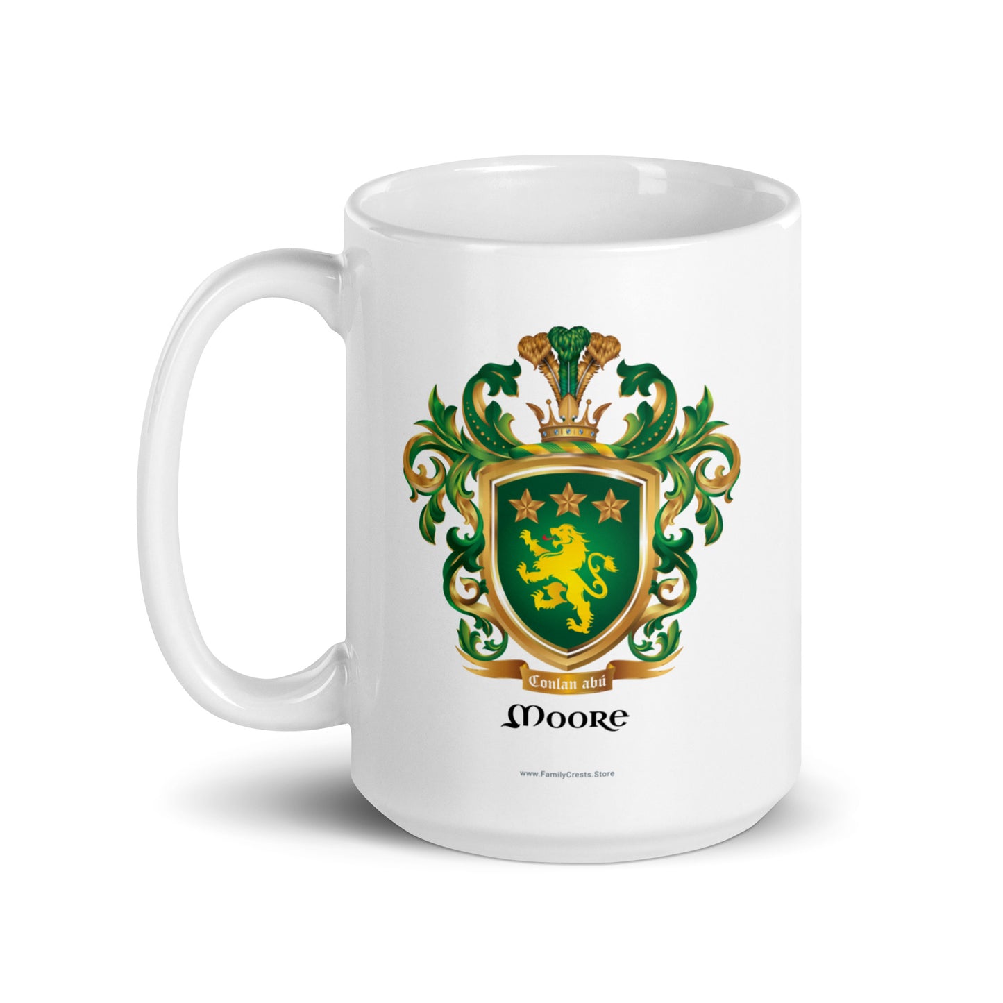 A white mug with the handle on the left, showing the Moore Family Crest featuring a green shield with a golden lion and three gold stars with a crown on the shield and green and gold mantling all around with a motto'Conlan abu' under the shield which has a golden rim, and the name Moore under the motto and the mug pictured against a white background.