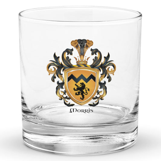 A clear classic heavy base rocks glass on a white background, printed with the Morris Family Crest featuring a black lion on a gold shield.