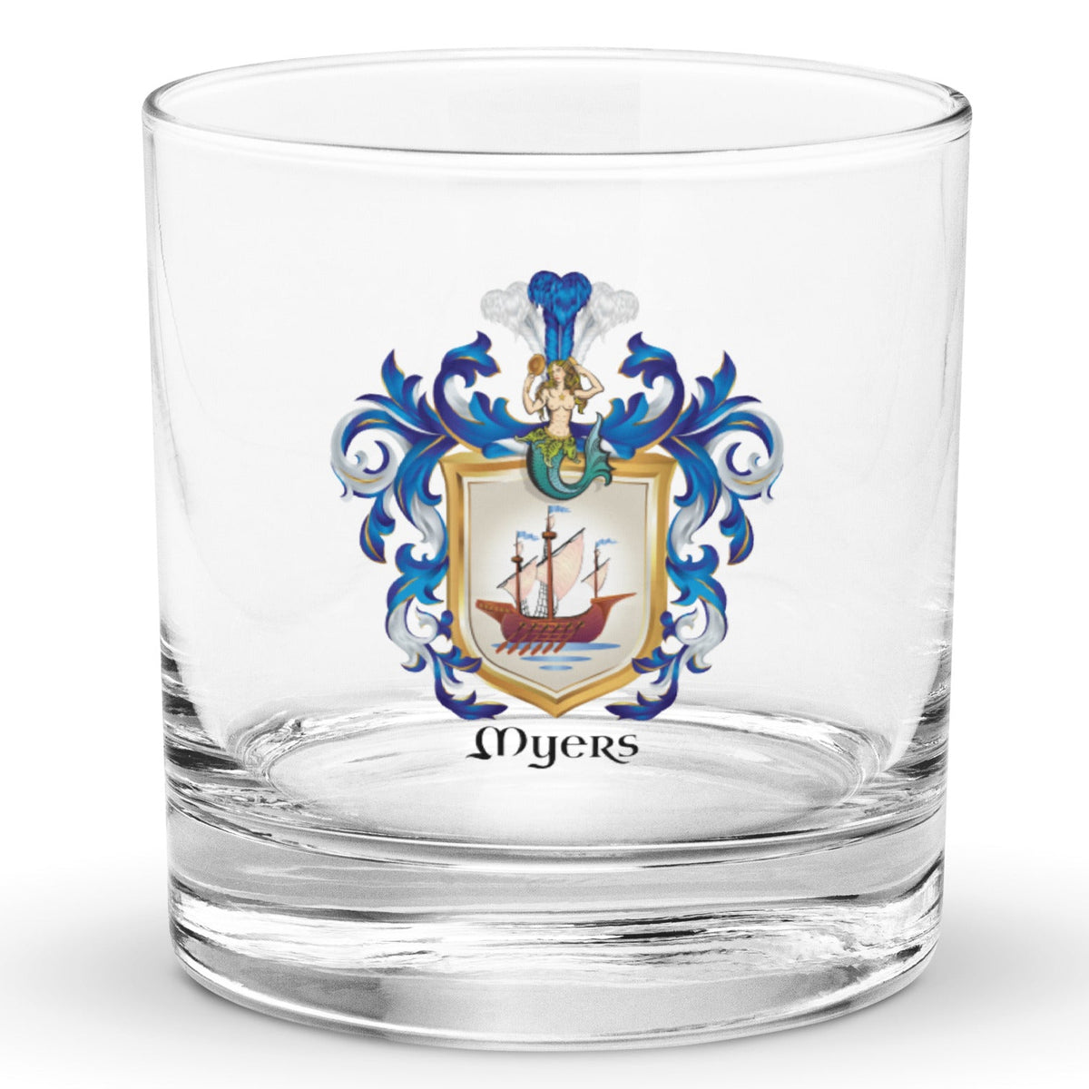 A clear classic heavy base rocks glass on a white background, printed with the Myers Family Coat of Arms featuring a wooden galley ship on a white shield with a mermaid at the crest of the shield.