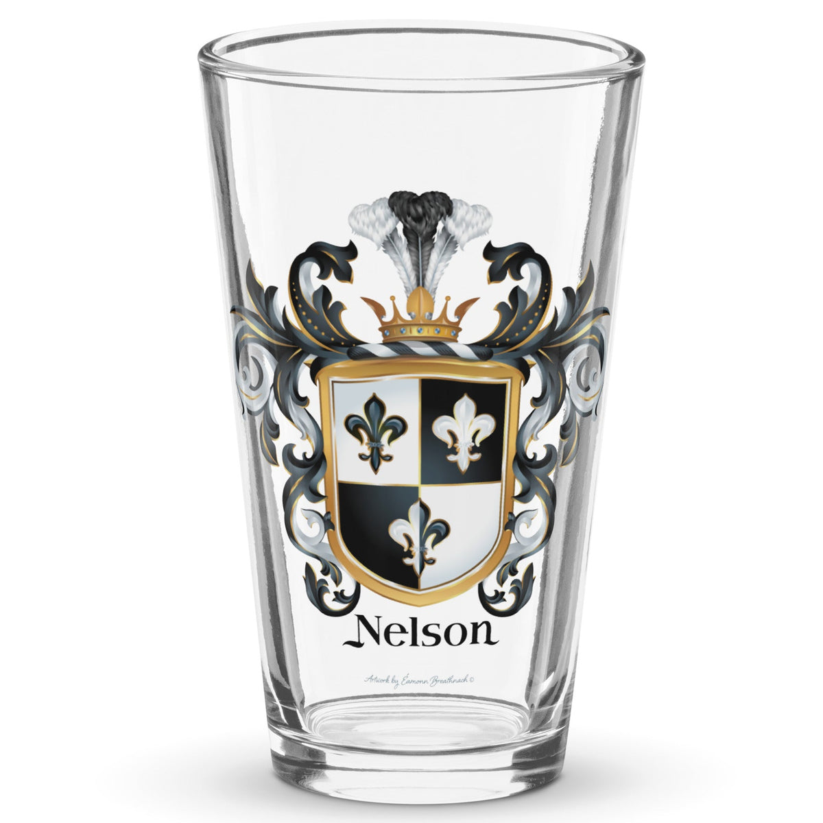 A pint beer glass with the Nelson Family Crest with 3 fleur de lis printed on it pictured on a white background.