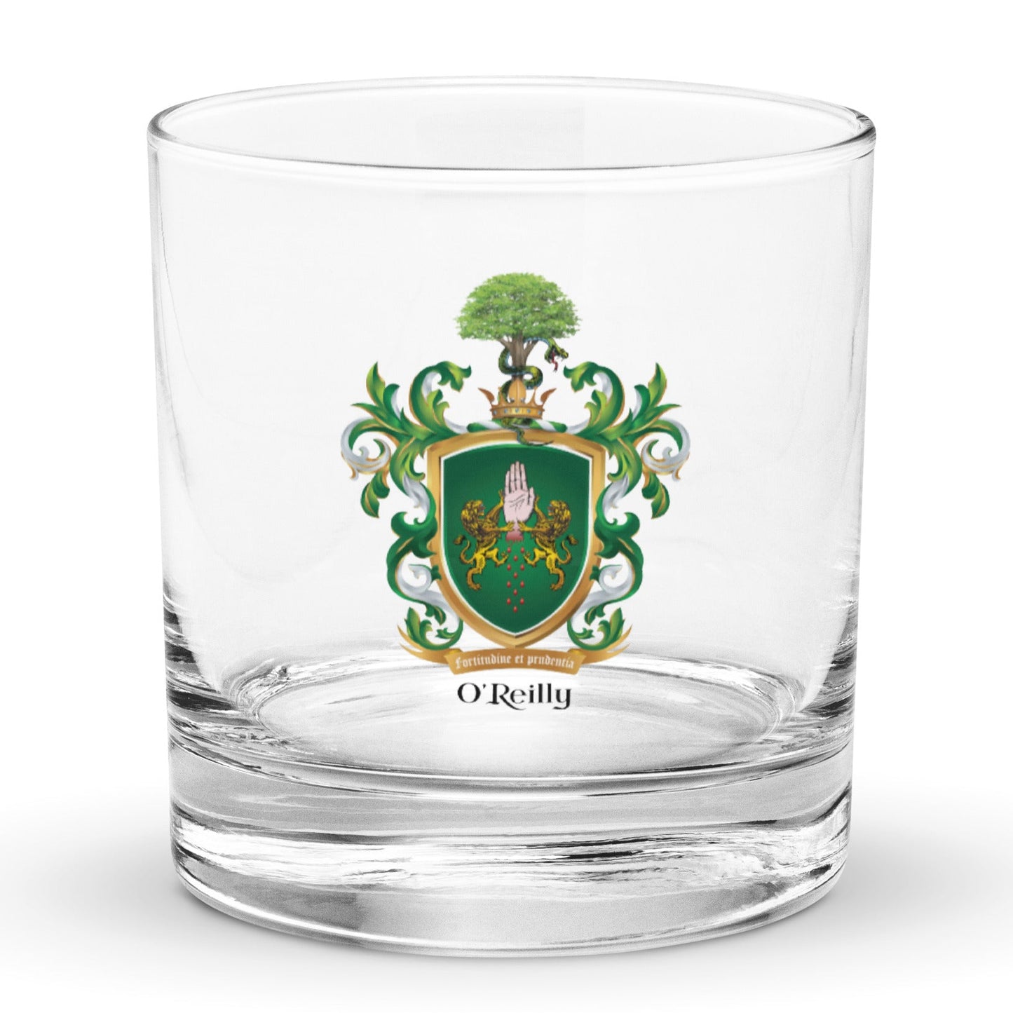 A rocks glass on a plain white backgrounf with the O’Reilly Family Crest on the front of the glass