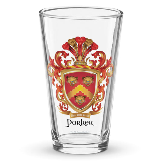 A clear classic pint beer glass on a white background, printed with the Parker Family Crest featuring three roaring leopard heads on a red shield with a gold chevron.