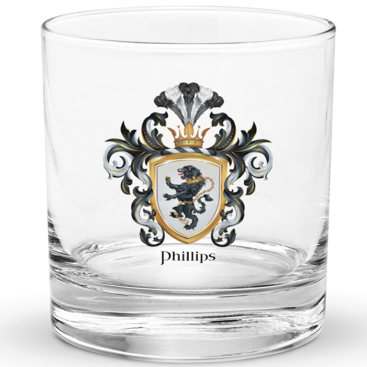 A clear classic heavy base rocks glass on a white background, printed with the Phillips family crest showing a black lion with a gold chain on a white shield