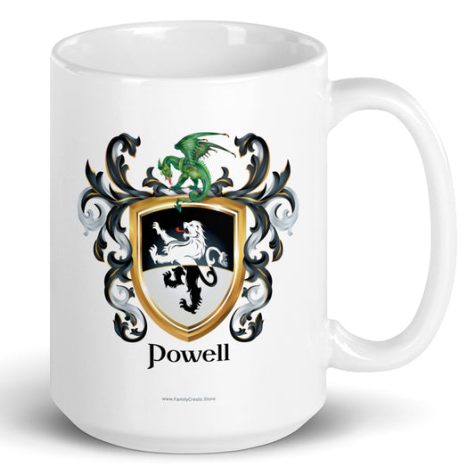 A white mug with handle to right, on a white background, printed with the Powell Family Coat featuring a black and white shield split with black in the top half, white in the bottom, with a standing lion that also has a white-black color split, and above the lion is a dragon sitting on the crest, and the shield is surrounded with black and white mantling, with the name Powell beneath it in elegant heraldic lettering.