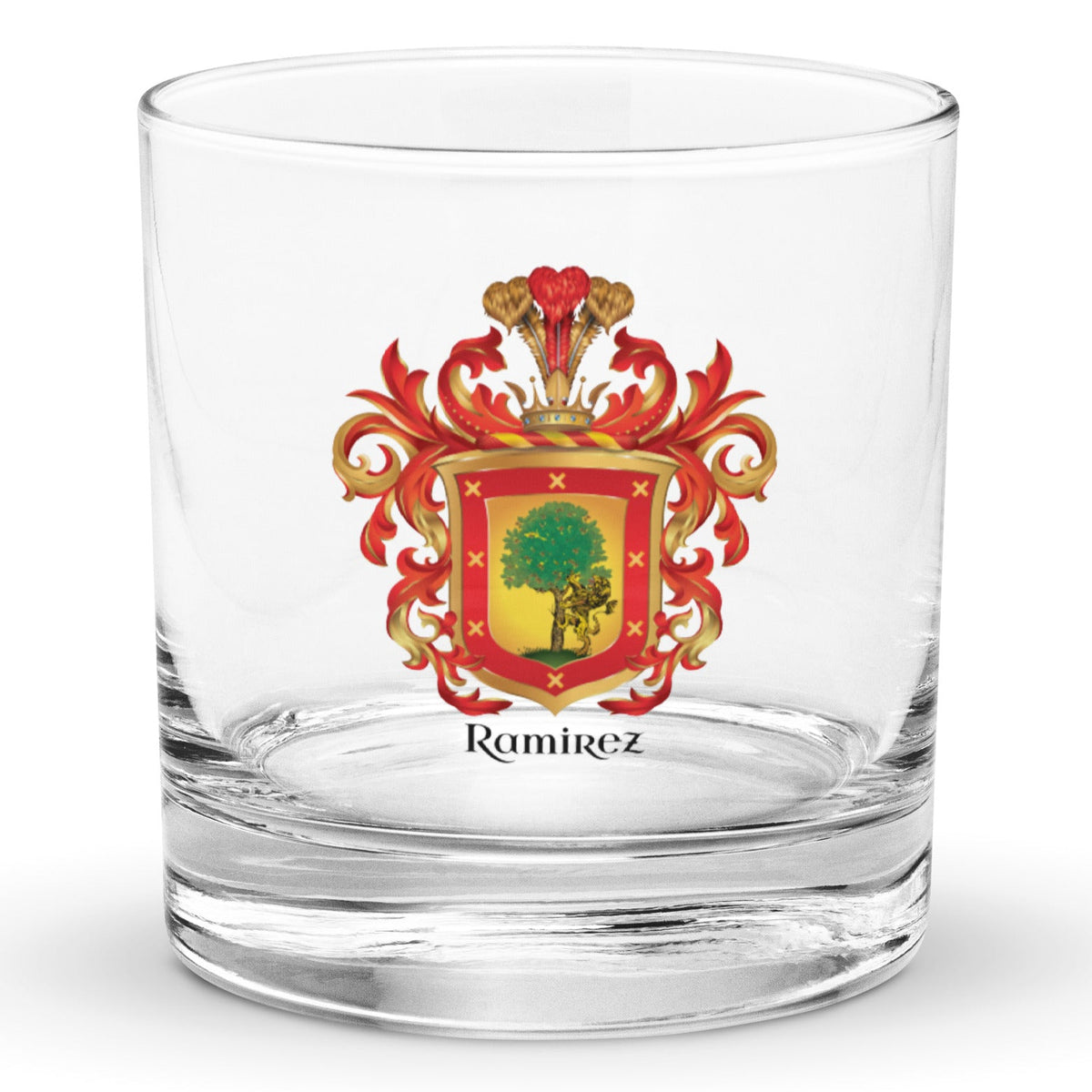 A classic clear heavy base rocks glass with the Ramirez Family Crest featuring a lion and an oak tree