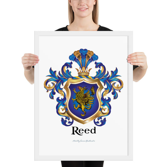 A woman standing in a white background, holding a white framed print of the Reed Coat of Arms featuring a blue shield with a gold griffin.