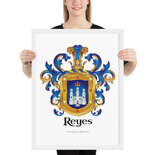 A woman standing in a white background, holding a white framed print of the Reyes Family Crest which features a blue shield with a white castle and crown.
